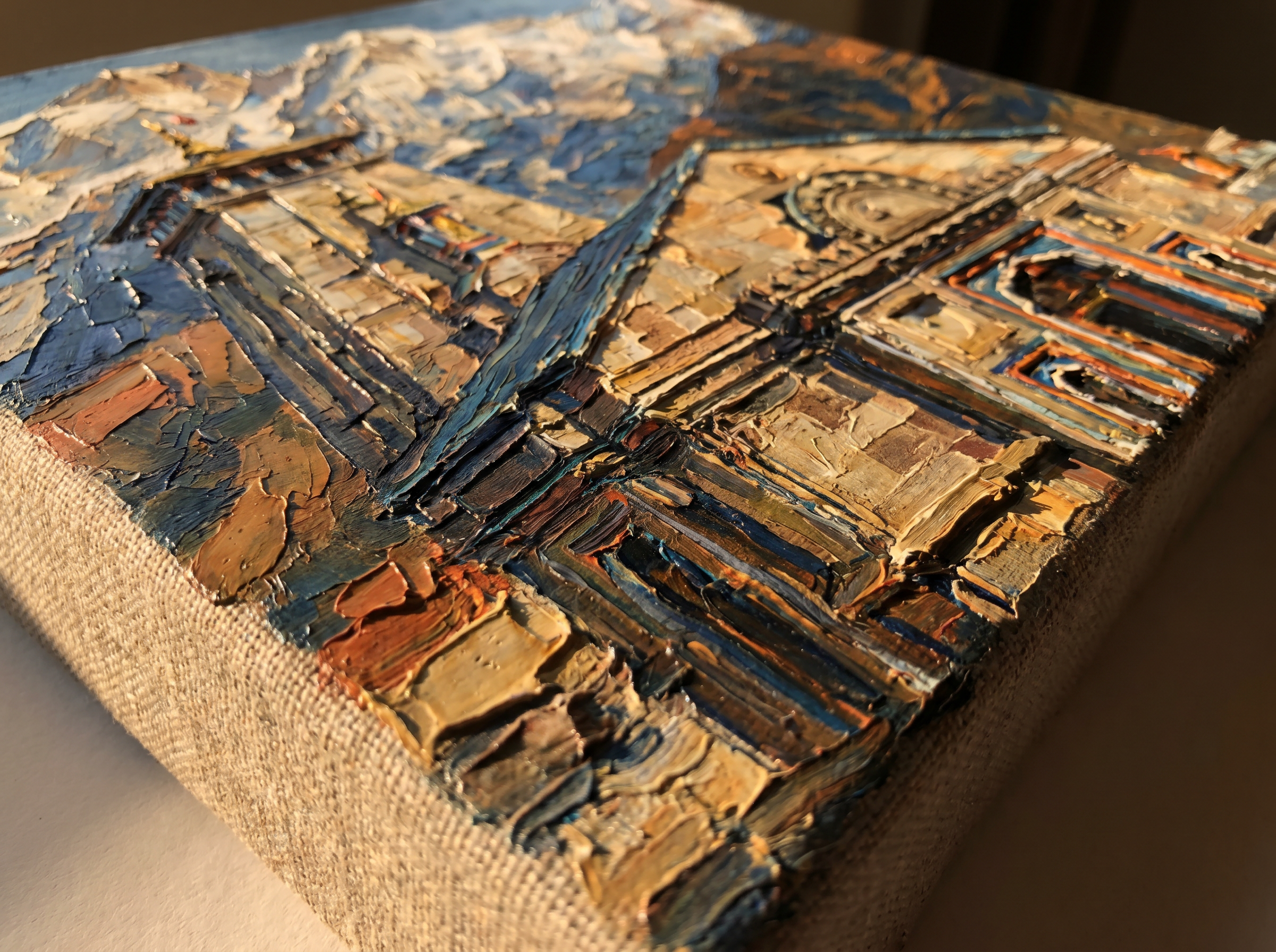 The studio &mdash; sketch and brushwork on a stretched canvas.